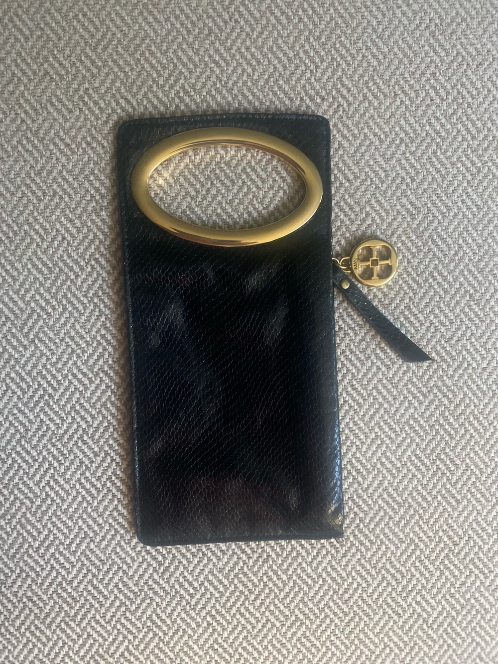 IMAN Black Leather Wristlet Clutch with Gold Accent Handle